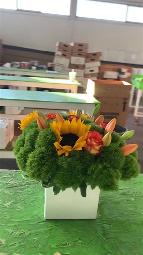 Flower arrangements by Fishing, downtown Denver. #Fishing,,DowntownDenver #Fishing,Colorado #FlowerArrangements #Flowers #Lilies #Roses #Sunflowers #GreenTrick #Vase #Viral#Fyp ##Scale#T#Talent