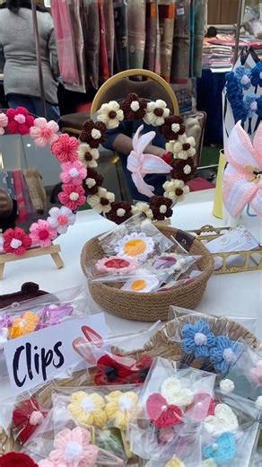 the.crochet.duo on Instagram: "A tiny tour of our colourful crochet stall ❤️🥹. #crochet #crochetlily #crochetrose #crochetbouquet #crochetspecsholder #crochetblankets #crochetdrawstringbag #overwhelmedwithlove"