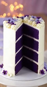 Quick Recipe: Purple Velvet Cake with White Chocolate Cream Cheese Frosting 💜 A stunning, vibrant purple cake with a tender crumb, topped with a luxuriously smooth white chocolate cream cheese frosting—perfect for celebrations! Ingredients 💜 Purple Velvet Cake Layers 2 ½ cups (315g) all-purpose flour 1 ½ cups (300g) granulated sugar 1 tsp baking soda 1 tsp baking powder 1 tsp salt 1 tbsp unsweetened cocoa powder 1 ½ cups (360ml) vegetable oil 1 cup (240ml) buttermilk, room temperature 2 large 