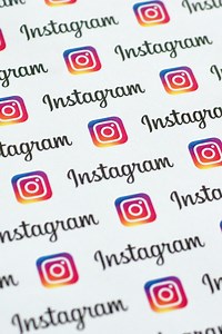 Download Instagram pattern printed on paper with small instagram logos and inscriptions. Instagram is American photo and video-sharing social networking service owned by Facebook