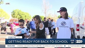 Volunteers help students get ready for back to school
