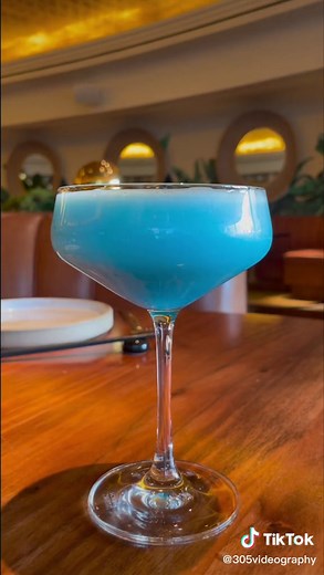 Manhatini #cocktail #drink #garnish #foam #blue #vodka #mixology #mixologist #creative #restaurant #bar #bars #OverwatchMe #andGO #drinks #miami #fl #seats #martini #garnishingideas