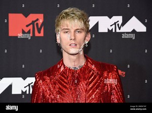 Machine Gun Kelly arrives at the MTV Video Music Awards at Barclays Center on Sunday, Sept. 12, 2021, in New York. (Photo by Evan Agostini/Invision/AP Stock Photo - Alamy