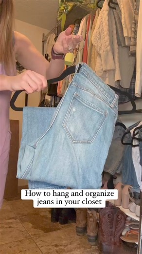 32K views · 292 reactions | The most aesthetic way to hang jeans in your closet! Here’s how to fold pants on hangers to save closet space and always find the perfect pair to wear. #organization #closetorganization #organizationhacks #cleaninghacks #organizedlife | Homeaglow | Facebook