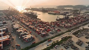 Cargo truck carry container for load to cargo ship ,many Trucks in the international terminal logistic depot sea port concept freight shipping transportation and