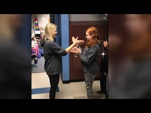 Teacher's custom handshakes go viral