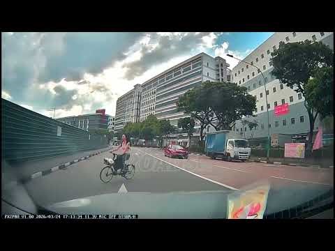 A cyclist rode against the flow of traffic and nearly caused an accident.