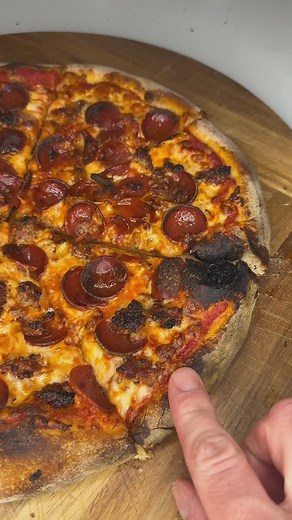 Sam Cagle on Instagram: "Meat lovers 襤 Baked in my home oven at 550° for almost 10 mins. Bacon - Italian sausage - fresh cut pep Follow for more homemade pies  #homemade #pizza #meatlover #asmr"