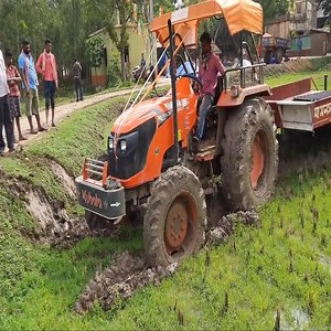 35K views · 15 reactions | Kubota MU5501 4WD pulling hervester trailer from muddy field - Helped Mahindra 595 Di and the end | RKM TV Show | Facebook