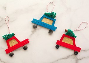 8.2K views · 99 reactions | These adorable car Popsicle stick Christmas ornaments couldn’t be easier to put together with a few inexpensive supplies. The ornaments also make great photo frames for your family holiday portraits! | Factory Direct Craft | Facebook