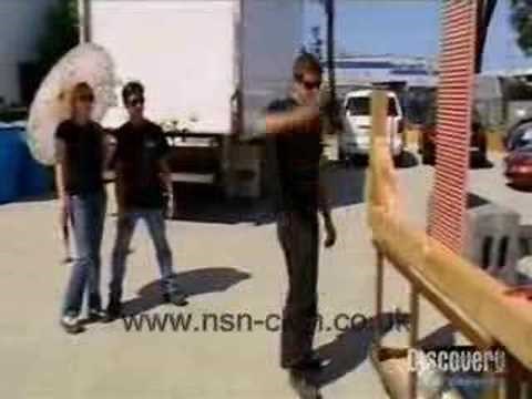 Mythbusters - Tori throws a hammer at Grant