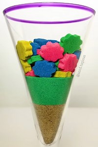 Colorful sand art: a creative display in glass