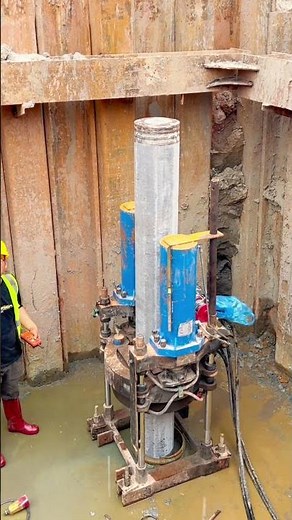 Hydraulic Piling Machine Operating in a Construction Trench