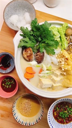 Time for Hot Pot and this miso-based vegan hot pot is the perfect holiday meal for family and friends! https://iheartumami.com/vegan-hot-pot/ Made with soy milk and miso, this Japanese-inspired nabe hot pot tastes creamy and milky, yet umami-rich. Feel free to add any vegetables and toppings you like and pair them with FIVE hot pot dipping sauces we have on the blog! | I Heart Umami
