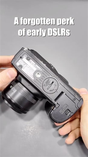 Shuttario on Instagram: "A hidden DSLR feature from the past. Old Canon DSLRs featured a removable CR2032 coin‑cell backup battery on the bottom of the body, keeping the camera’s date, time, and settings saved when the main battery was removed. Camera: Canon EOS 10D #canon10d #backupbattery #dslr #vintagedslr #dslrcamera"