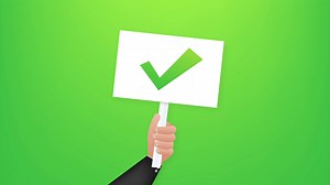 Hand holding placard Yes and No. stock illustration.