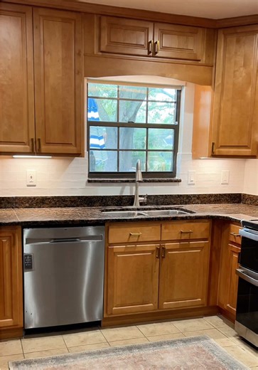 Kitchen backsplash remodel with under cabinet lighting upgrade ✨ We tore out the old tile, ran new wiring for under cabinet lights, patched the drywall, and installed bright white backsplash tile to completely transform this kitchen. It’s crazy what better lighting and a clean tile choice can do for a space. Brighter, fresher, and way more modern without changing the entire kitchen. Thinking about updating your kitchen? Start with the backsplash and lighting. It changes everything. #KitchenRemod