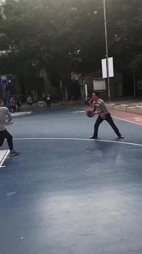 Outdoor Basketball Showdown: One-on-One Game