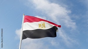 Flag of Egypt on a blue sky, flag on a flag pole waving in the wind, african country, maghreb, national symbol of Egypt, video of a flag