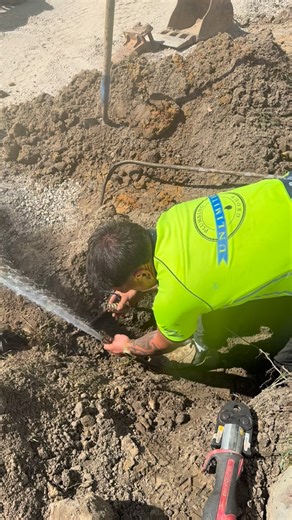Unlimited Plumbing Group on Instagram: "Live water main? No problem 💦 Perfect time for the apprentice to earn his stripes — first live ball valve install! 😎🔧 Sink or swim moment right there 😂"