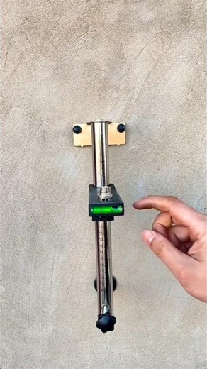 MASONRY Workers Use Wall mounted Level Brackets for Perfect Tile Laying?