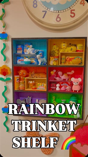 Audrey Herbertson on Instagram: "This one is for the collectors My rainbow 🌈 trinket shelf Who else is a trinket girlie? #trinkets #retro #miniatures #inspo #collection"