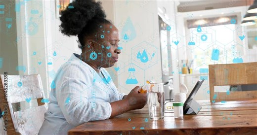 Mature woman seeing tablet cue while opening bottle and checking dose health icons overlaying hands