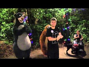 Baloo and King Louie dance with Tommy