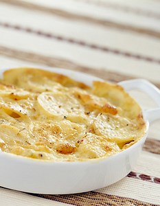 Gratin de pommes de terre aux lardons et au jambon pour 4 personnes - Recettes - Elle à Table