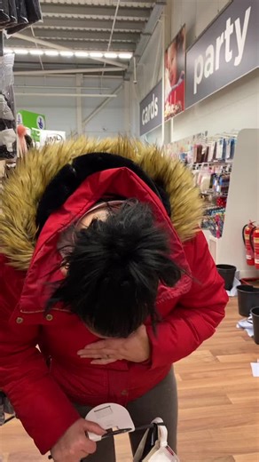 Inspecting Bras in a Retail Lingerie Store