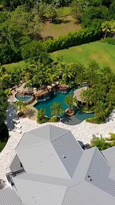 90K views · 2.1K reactions | From Start to Finish, We Design and Build Insane Pools! 12-foot tall grotto, beach entry, water slide, spa with built-in bar, lazy river, tiki hut, and beautiful landscaping. What do you think of this award-winning project? #insanepools #lucaslagoons #pool | Lucas Lagoons | Facebook