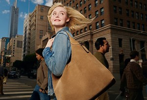 Ad of the Day: Coach and Elle Fanning make time stand still in NYC