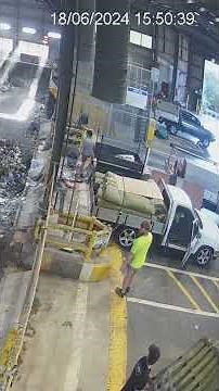 Exploding battery launches into the air towards worker