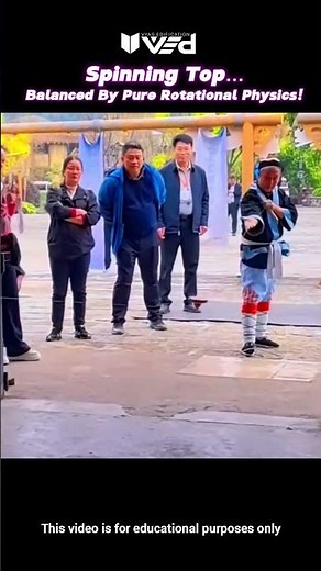 Spinning Top Defies Gravity?! It’s Angular Momentum #shorts #viral