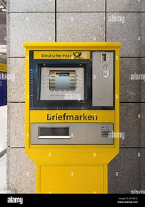 Frankfurt, Germany - Aug 27, 2022: Front view of Deutsche Post snaps briefmarken vending machine with digital display to choose the right version of the postage stamp Stock Photo - Alamy