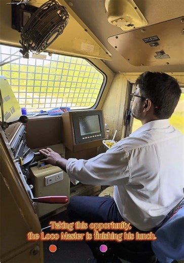 LM Enjoys Lunch on the Go: A Train Driver's Break