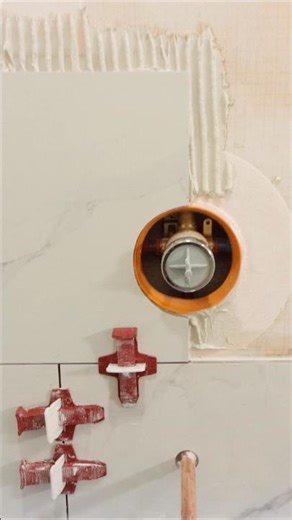 How to Tile Around Shower Valves - #shorts #tileshower #homerepairtutor