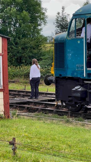 The signalman collects the single line token from the Jinty steam locomotive as it arrives at Swanwick station. The #class44 waiting to move forward, and the #class66 already at the platform with its passenger train. Interesting movements at the Midland Railway - Butterley event. #uktrainspotting #trains #diesellocomotive #britishrailways #railway #railways #trainspotting #railroad #steamtrain #heritagerailway | Adrian Watson
