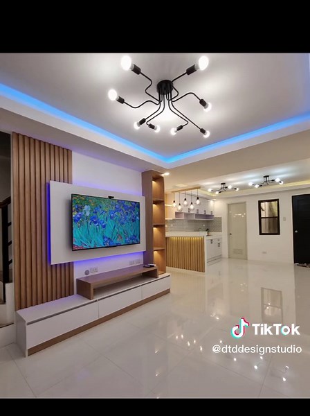 Living room and kitchen improvement by #TeamDTD with our beat selling Modern TV console with LED backwall. #dtddesignstudio #diytataydan #LegitContractor #modularcabinetmakerph #gawangdtdyern #modular #tvbackwall #tvconsole #interiorfitout #beforeandafter