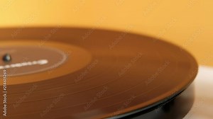 Lp vinyl record finishing to play on a turntable. vintage vinyl record on record player turntable. Audio equipment for club party. Soft focus. Close up