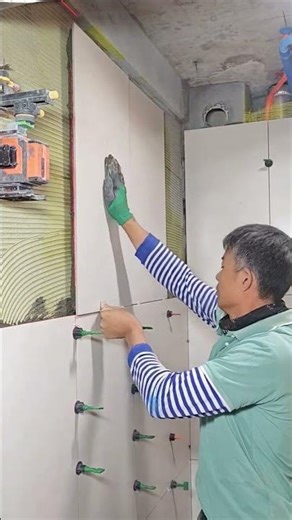 Precision tile installation—every piece aligned perfectly for a clean, professional finish 🔧🧱✨