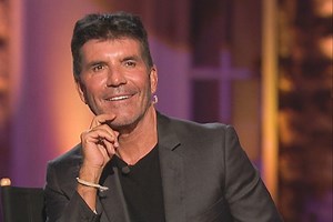 Simon Cowell in 'a lot of pain' after back op & girlfriend's in 'total shock'