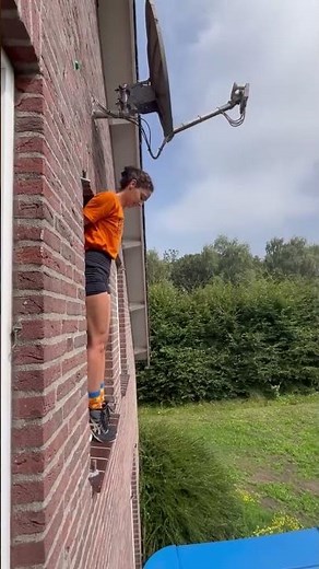 Epic Stunt: Girl Jumps Out of Window Onto Trampoline and Back Inside! 😯
