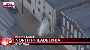 Water main break flooding North Philadelphia street