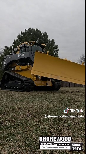 Come with us to take a look at the John Deere 335P with SmartGrade! #shorewoodhomeandauto #johndeere #landscaping #construction #skidsteer