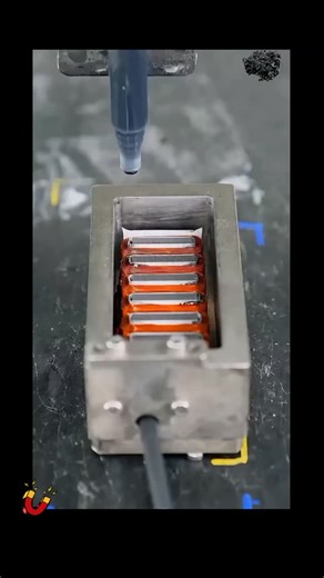 ‎F.JALILI(جلیلی)‎ on Instagram‎: "✳️At this stage, a black liquid is poured directly onto the finished coil; this process is called potting. Inside is a copper coil wound with extreme precision, which, together with the iron core, creates a magnetic field. The potting locks the coil tightly so that moisture or vibration cannot loosen it. After hardening, this block becomes the stator of the linear motor. When a slider with a magnet is placed on it, the force between the coils and the magnets cre