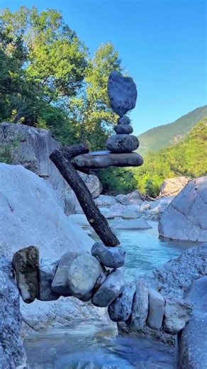 Stone balancing is a meditative discipline where rocks are stacked without adhesives, relying solely on gravity and friction to create precarious, temporary sculptures. Popularised by artists like Adrian Gray, this practice demands extreme patience and focus to find the precise points of contact that allow heavy stones to defy visual expectations. #beach #river #outdoor