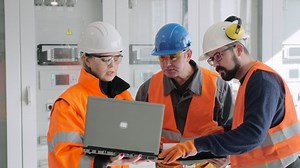 clip-1063027309-team-employees-uniform-laptop-papers-do-pre-commissioning