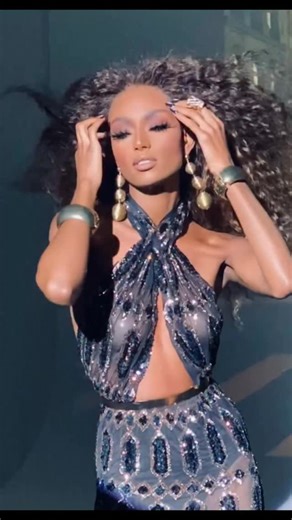 Holiday glam isn’t ‘nice.’ Holiday glam is ‘who is THAT?’ Black, glitter, wind machine and zero apologies. 30% off with UNWRAP30 — unwrap something iconic. | Scott Barnes Cosmetics