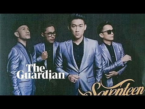 Wave crashes into stage at Indonesian pop band concert